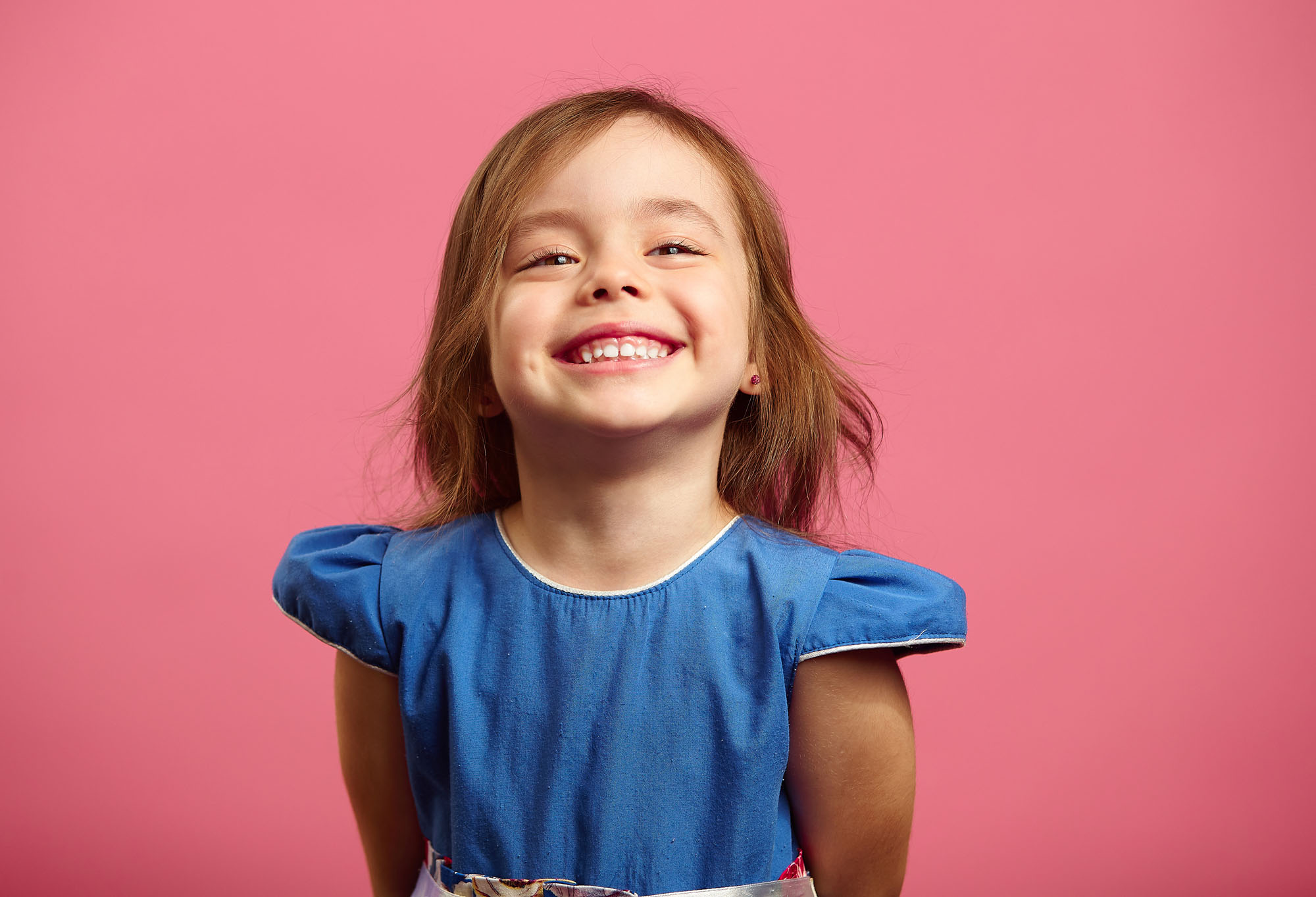 Child smiling with her white teeth | Children's Dentistry of Elko