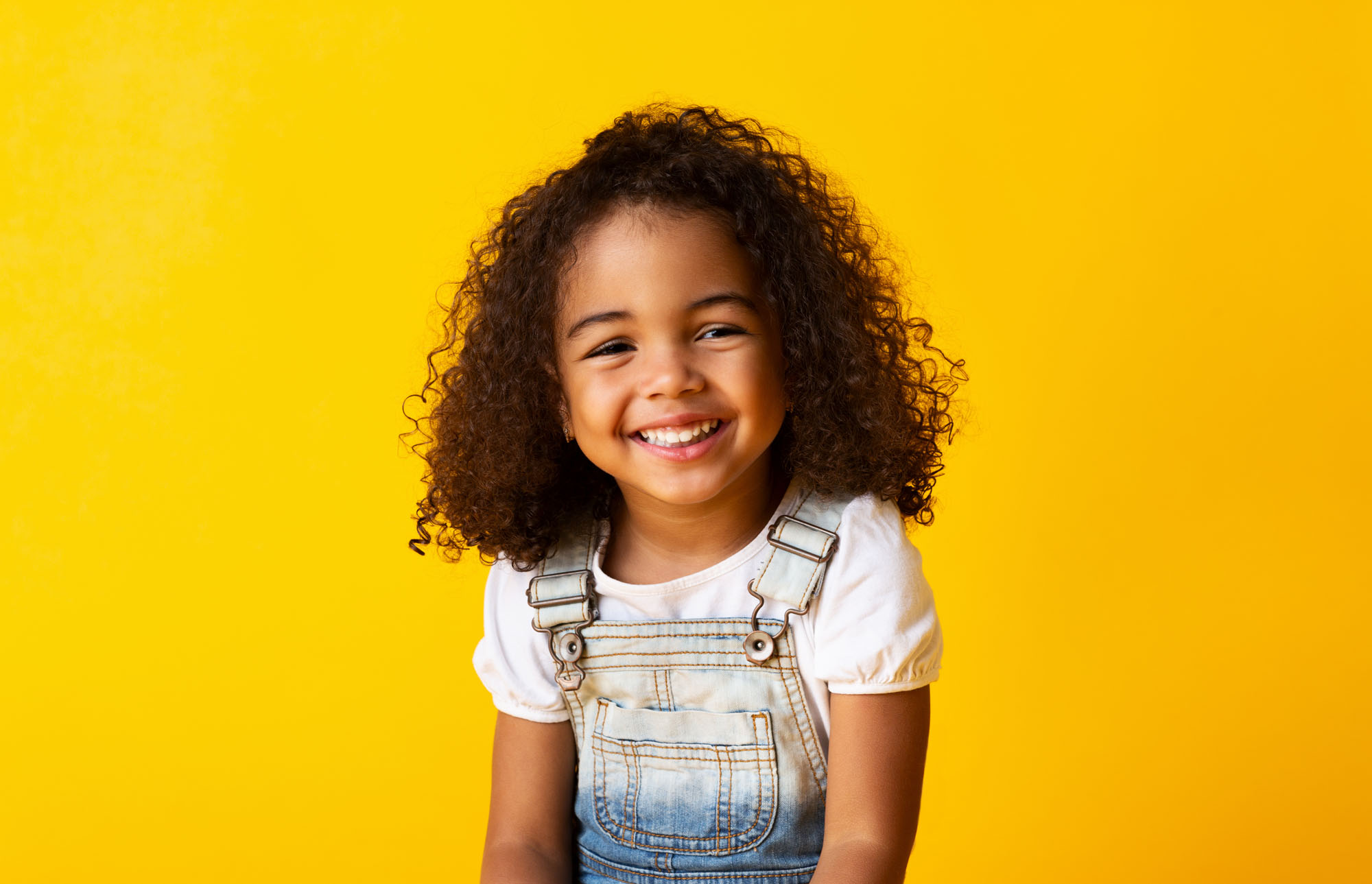 Young girl smiling after a teeth cleaning | Children's Dentistry of Elko